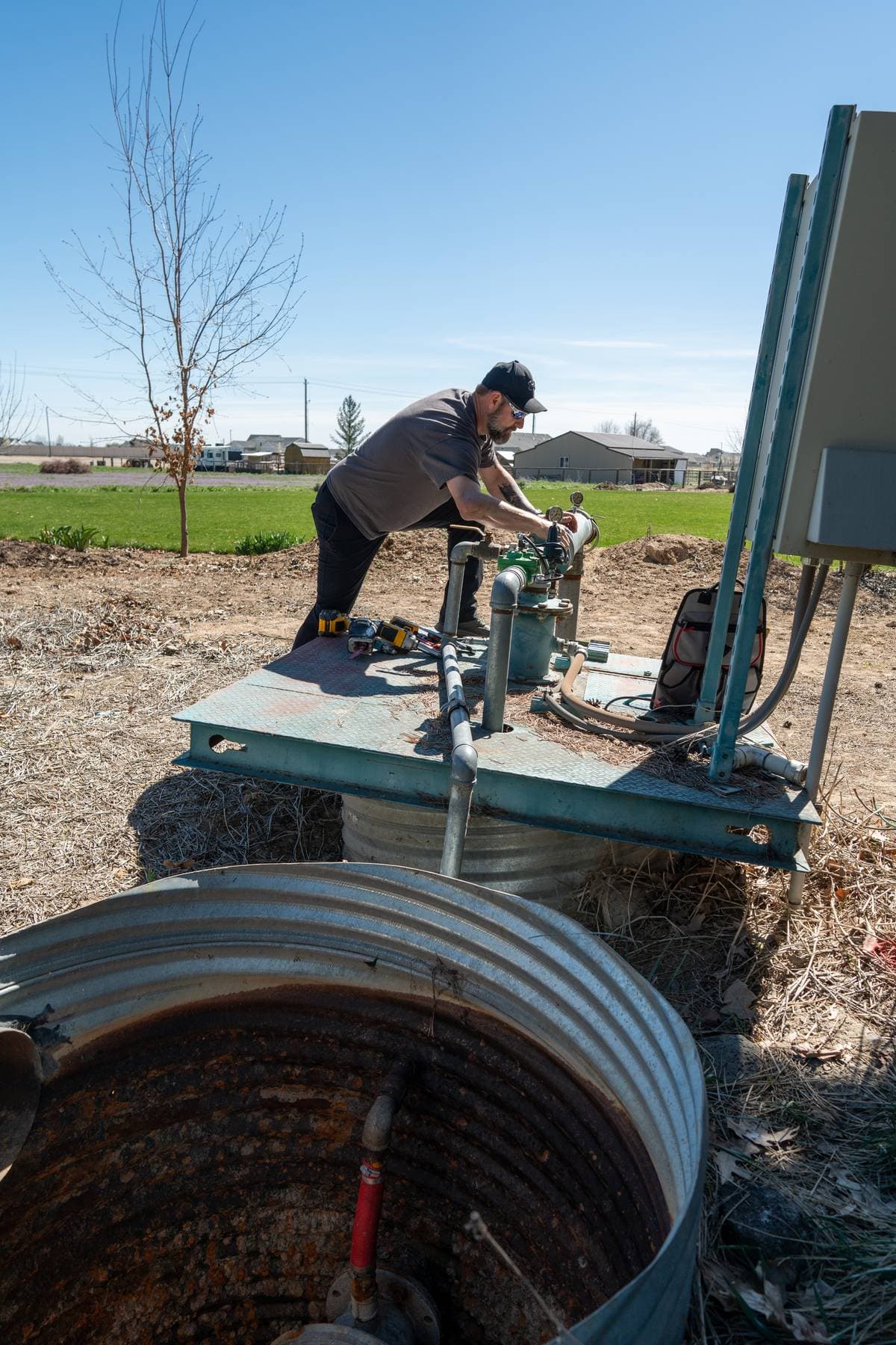 Technician working on a pump system.